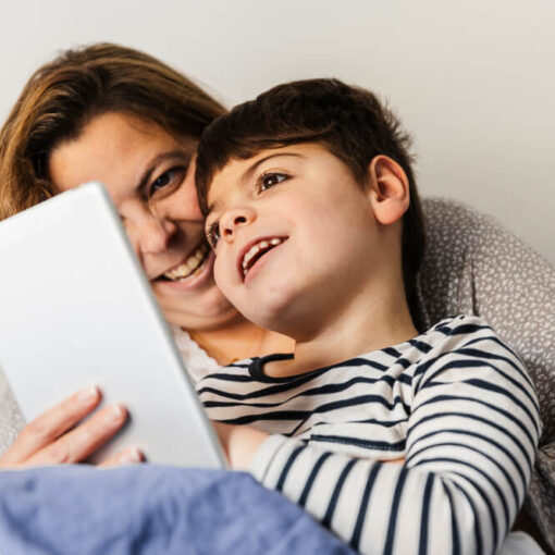NDIS Participant and mother looking at tablet